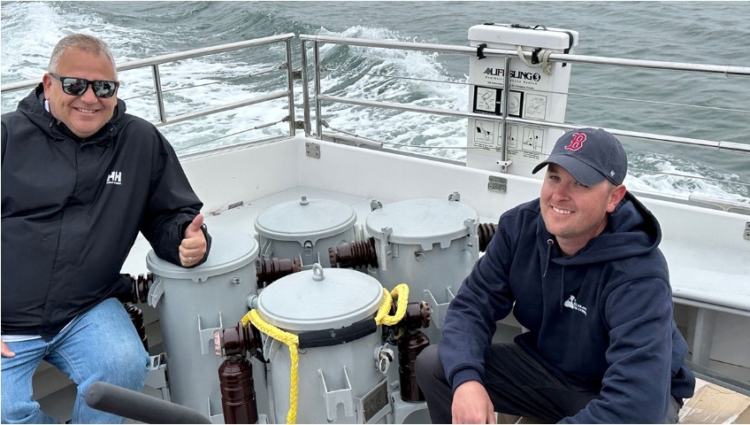 Jeff Wright and Evan Carey from the Block Island Utility District with transformers